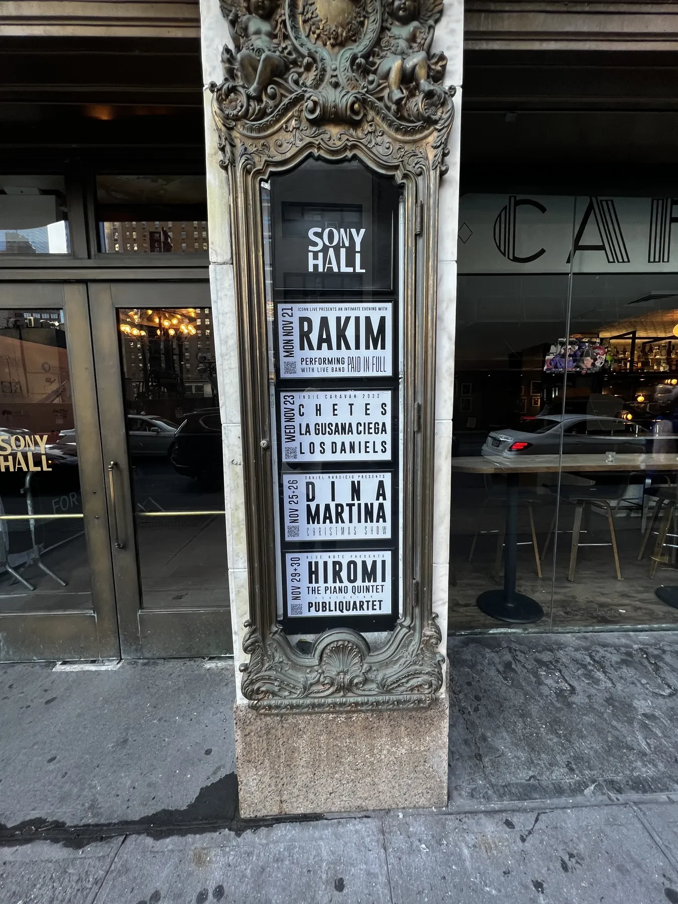 Installed marquee, the full bronze case from crest to stone base, billing Rakim, Chetes, Dina Martina, Hiromi