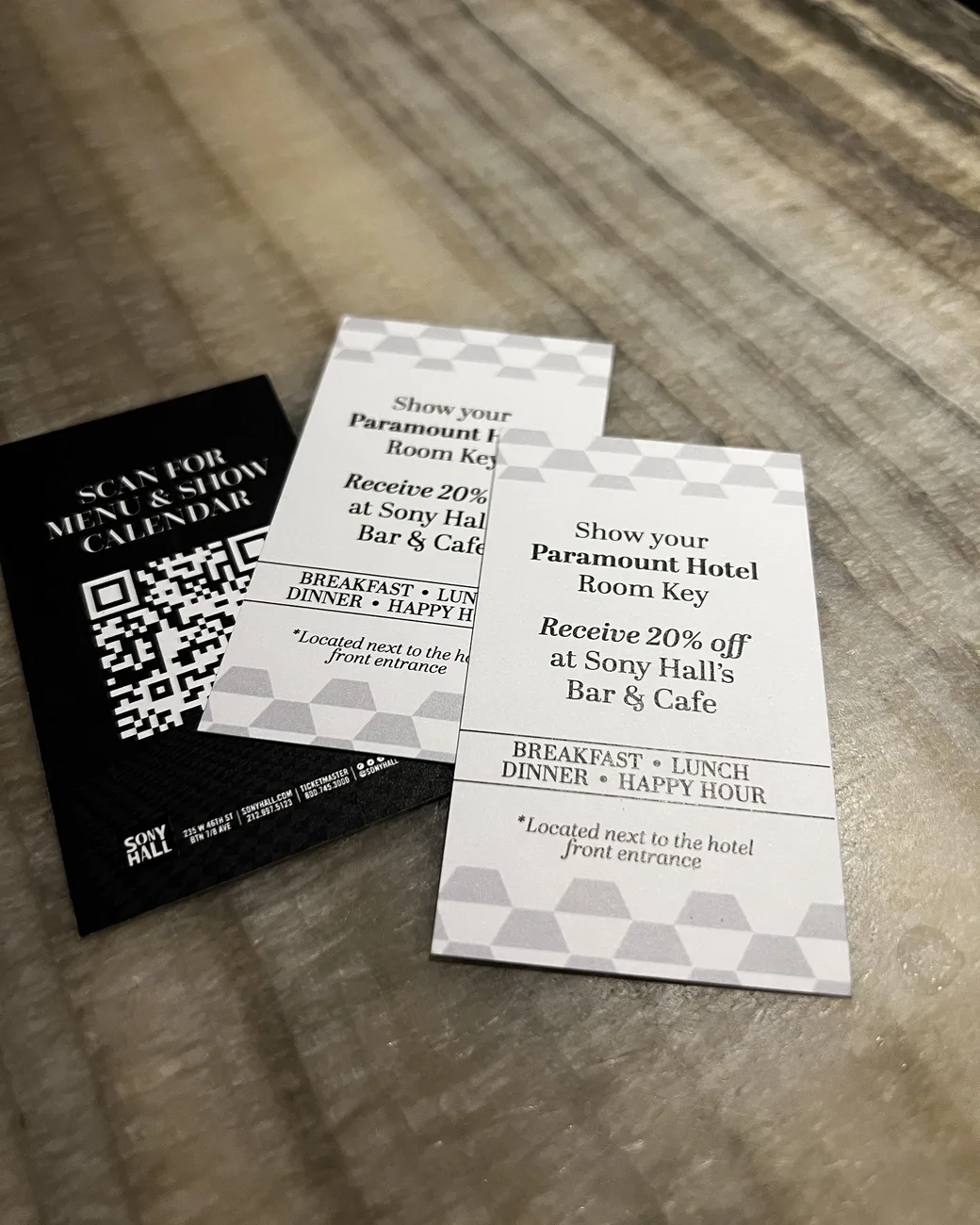 Paramount Hotel room-key offer cards and a QR menu card